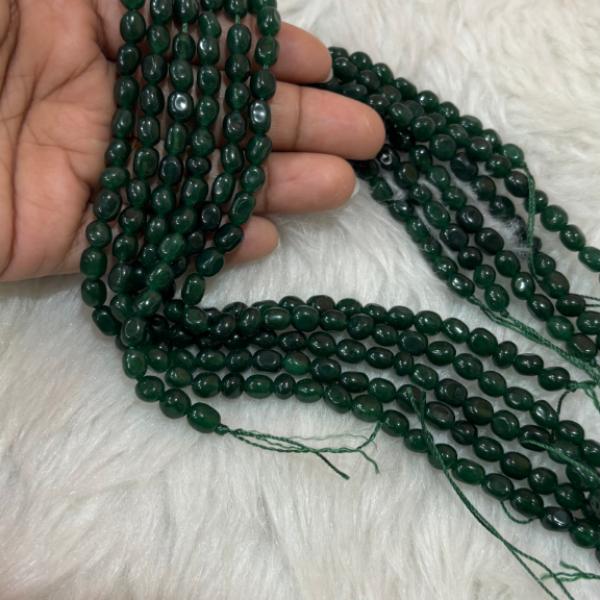 Dul Dul Beads Green colour   5 X 7mm approx