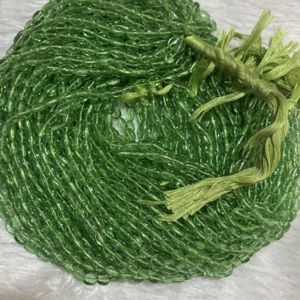 Monalisa Flat oval shape Beads  Parrot Green 4.5x7mm, Minimum Order Qty 2 lines